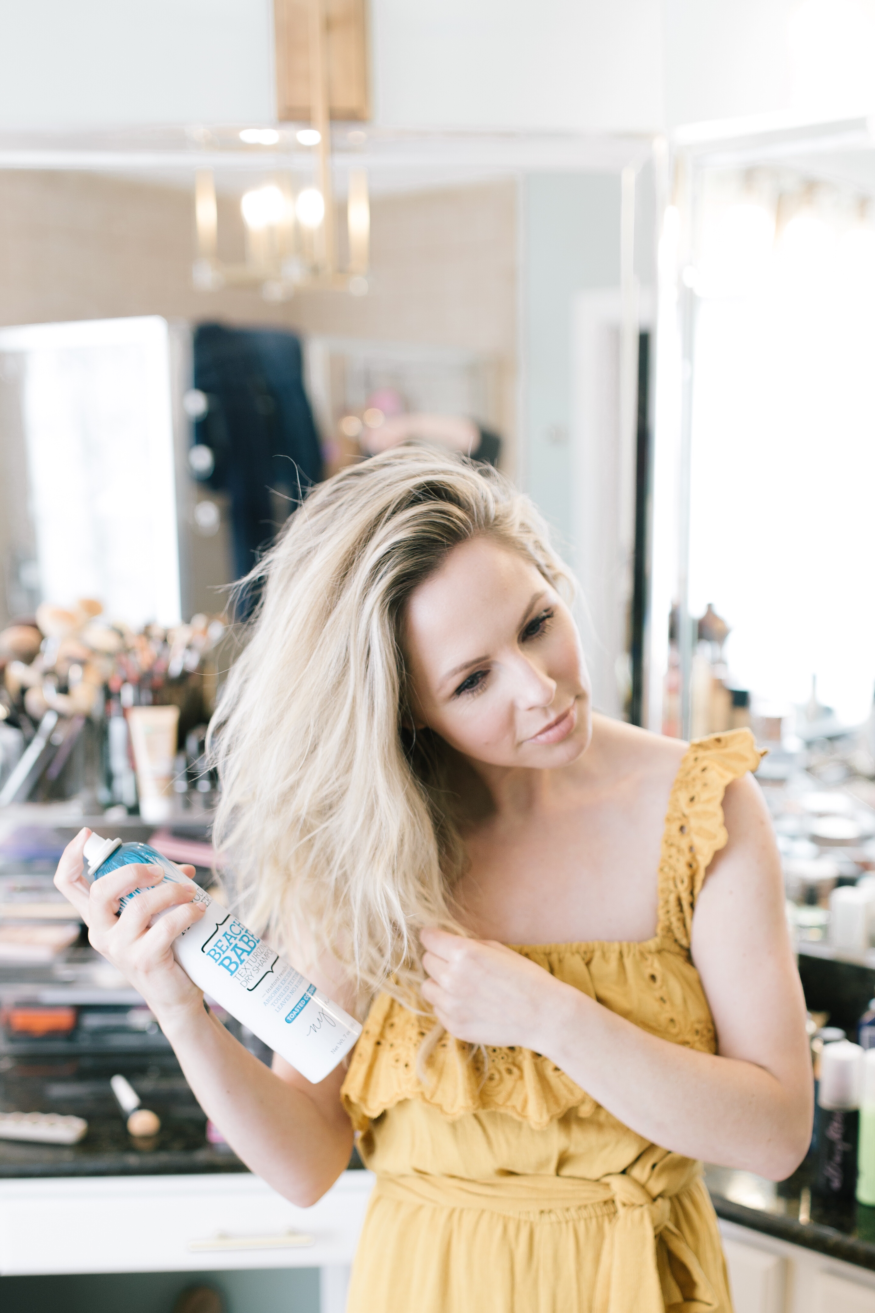 BEST HAIR PRODUCTS FOR VOLUME AND PROTECTION - Nashville Wifestyles; My long blonde hair situation is out of control. So much hair. And I dig it. My hair is one of my favorite parts on me and I really love to play around with all of the different hairstyles I can do with my thick locks. It has kind of a beachy wave texture to it, it's really thick and it's clearly colored so I have pretty much mastered what are the best hair products for volume I love to use on this mane. Click to read about the best Hair Products for Volume!. BEST HAIR PRODUCTS FOR VOLUME AND PROTECTION featured by popular Nashville beauty blogger Nashville Wifestyles