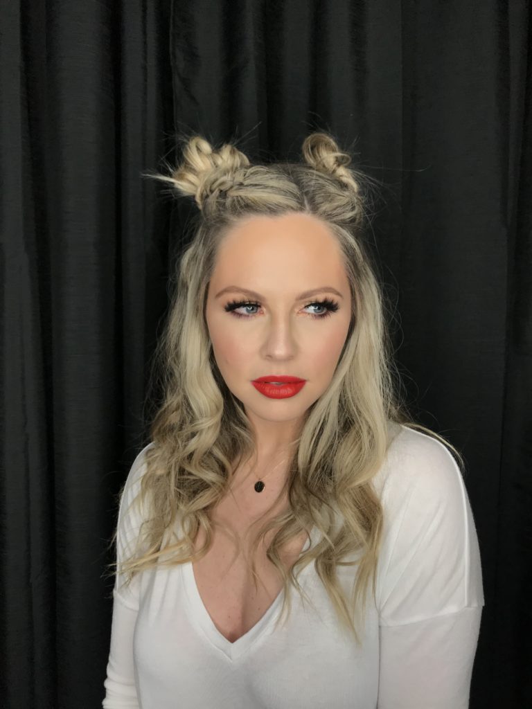New Years Eve Style Guide featured by top Nashville life and style blog, Nashville Wifestyles. Your Complete New Years Eve Style Guide: Hair, Makeup, Outfits & Party Ideas - Nashville Wifestyles; I’m loving these double dutch pigtail braids buns by my friend Courtney. It’s so fun and versatile that you can rock it during the holidays or two days long like I did even to run errands ha. She’s giving a step by step on my YouTube channel for you. with New Years comes more makeup looks, parties and recipes. NYE is the ideal time to be as EXTRA as you wanna be. Amp up your New Years Eve style and wear the sparkles, wear the red lip and the smoky eye, rock the glitter and big hair.