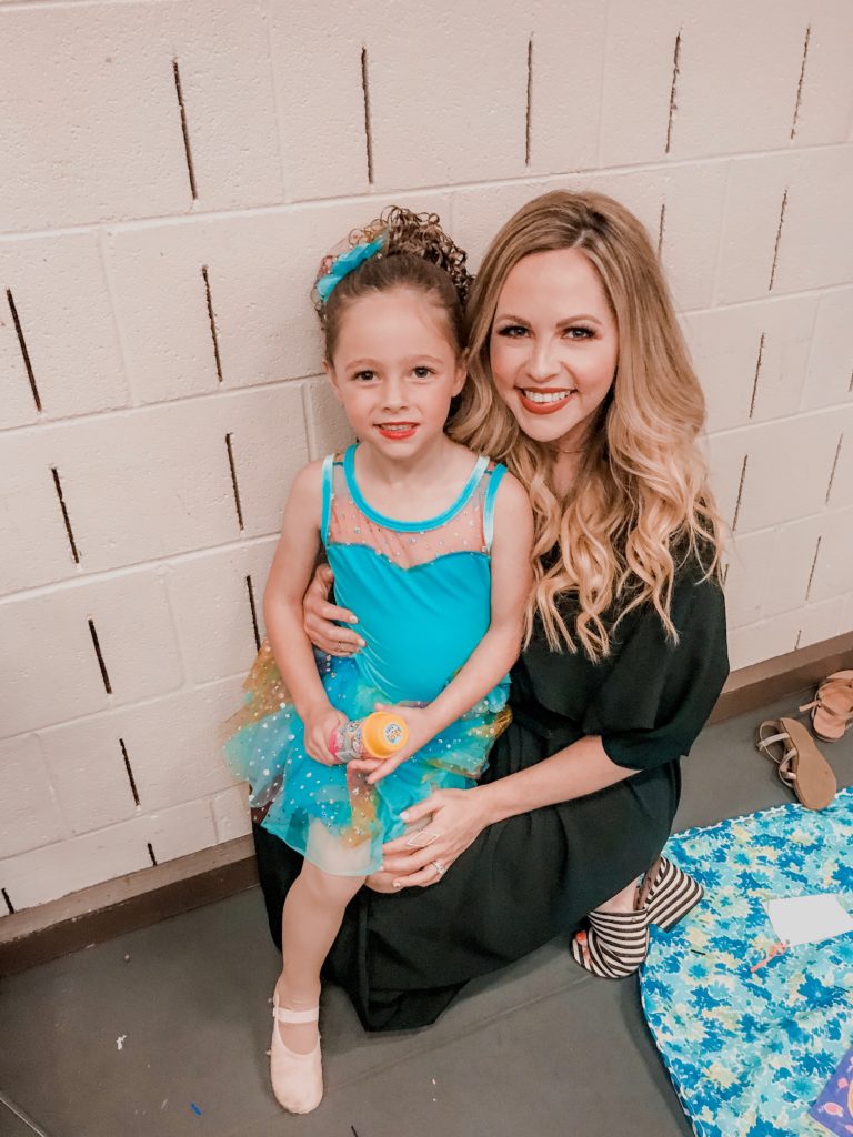 How to Prepare For a Dance Recital featured by top US life and style blog Nashville Wifestyles. How to prepare for a dance recital - Nashville Wifestyles; I never thought I’d be a dance mom! I’ll admit the worst part is the dance recital. I enjoy watching it but it’s so much work. You spend months sending your child to dance class until you see them on stage and burst with pride. My 1st year in the dance world with my kid, I had no idea what to do. It took me 2 years to figure out how to prepare for a dance recital. You need dance costumes and hair curls, not to mention recital makeup and more. Click to learn how to prep right! 