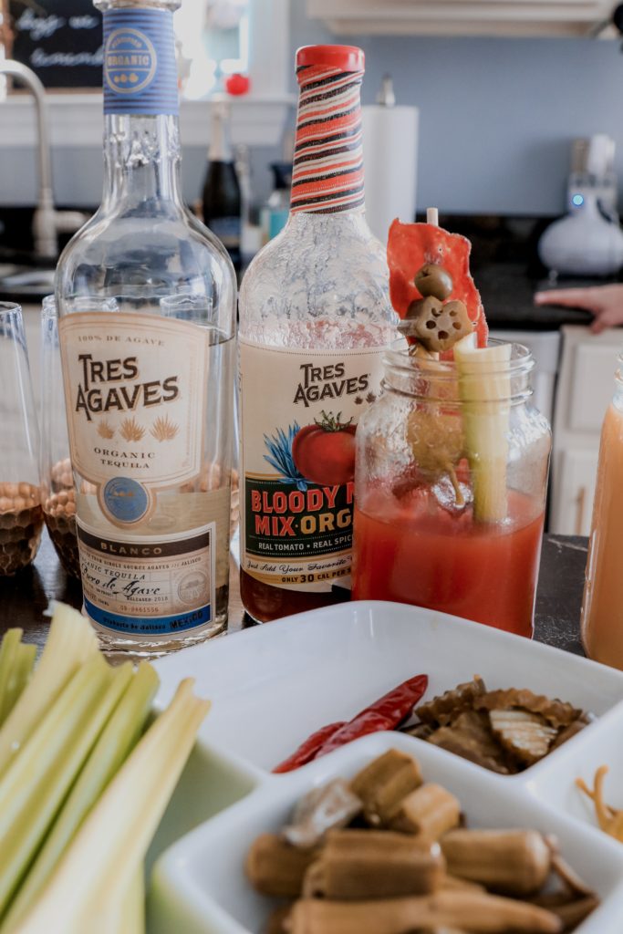 Bloody Maria: A Tequila Bloody Mary Recipe - Nashville Wifestyles; I love a good bloody mary. I love ordering them for brunch and they’re the best spicy cocktail. Luckily, I can make a bloody mary at home in less than 3 minutes. I recently discovered the most delicious bloody mary mixer that not only makes brunch time easier but is made with all natural ingredients. I substituted tequila for my bloody mary and it blew me away how delicious it was. So obviously I wanted to share with you guys this Tequila Bloody Mary Recipe. Click to read! Southern Style Brunch Ideas That Pulls Out All the Stops - Nashville Wifestyles; I had family in town last weekend so I decided to throw a brunch together for my family and friends before watching college football that Saturday. There's nothing more tasty than a family weekend brunch made up of tasty brunch recipes. Click to read how to throw a Sunday brunch at home on Nashville Wifestyles! For the waffles, I used the Kodiak protein waffle mix. We also had turkey bacon, fresh cut fruit salad, Nashville fried chicken and more for our brunch meal. | Southern Style Brunch Ideas That Pulls Out All the Stops by popular Nashville lifestyle blog, Nashville Wifestyles: image of a veggie platter and Tres Agaves drink mix.