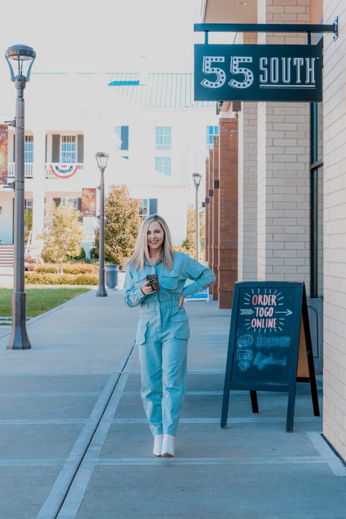 Boiler Suit Fashion styled for Fall by top US fashion blog, Nashville Wifestyles: image of a woman wearing an Express denim boiler suit.