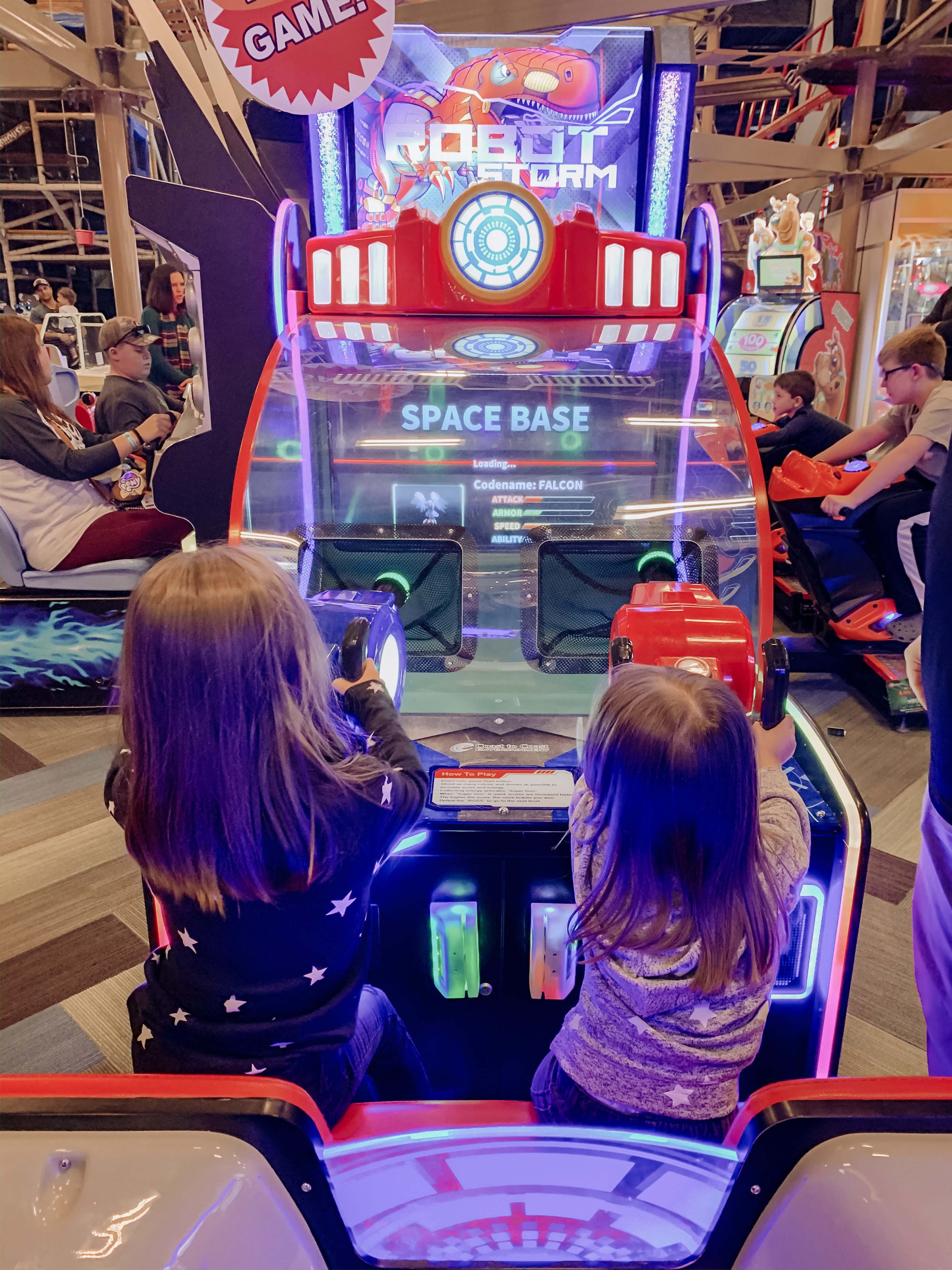 What To Do With A Weekend in Pigeon Forge || Wilderness At The Smokies - Nashville Wifestyles; The Smoky Mountains feel like home. I have spent many weekends in Pigeon Forge since I grew up close to the area in East TN. We went on school trips to Dollywood, my family rented cabins and I have many milestone moments there with Matt and the girls. How had I never been to Wilderness at the Smokies? I remember before I had children of my own hearing my friends talk about how amazing it was and how much fun their kids had. I had so much planned like driving to Gatlinburg. |What To Do With A Weekend in Pigeon Forge || Wilderness At The Smokies by popular travel blog, Nashville Wifestyles: image of a family at the Wilderness at the Smokies resort.