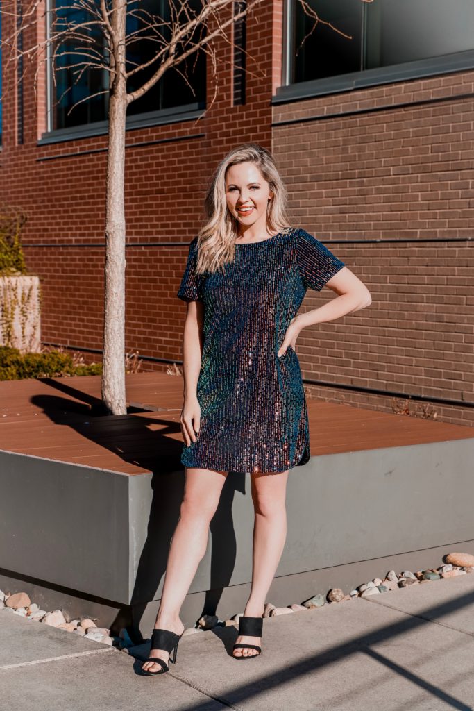 Holiday Looks With VICI - Nashville Wifestyles; Who else is covered up in holiday parties? I mean even if I'm not I just throw on a sequin dress for the heck of it because the holidays are my ABSOLUTE favorite. Between the work parties, family parties and your friend's Christmas gatherings VICI has you covered on your snazzy outfit needs. They keep dropping new collections and with each one I become more and more obsessed. ALSO these looks are perfect for New Years. Use my code ASHLEYH20 to get 20% off! Click for the looks! | Holiday Looks With VICI Fashion by popular Nashville fashion blog, Nashville Wifestyles: image of a woman wearing a Vici GIRL ON FIRE SEQUIN SHIFT DRESS.