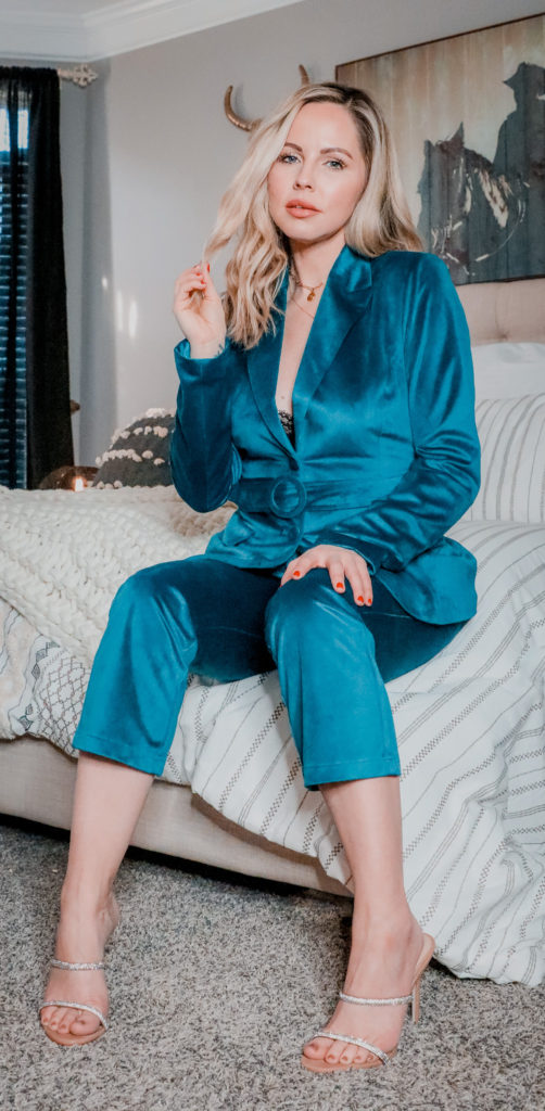 Top Statement Outerwear for Women by popular Nashville fashion blog, Nashville Wifestyles: image of a woman wearing a blue silk suit. 