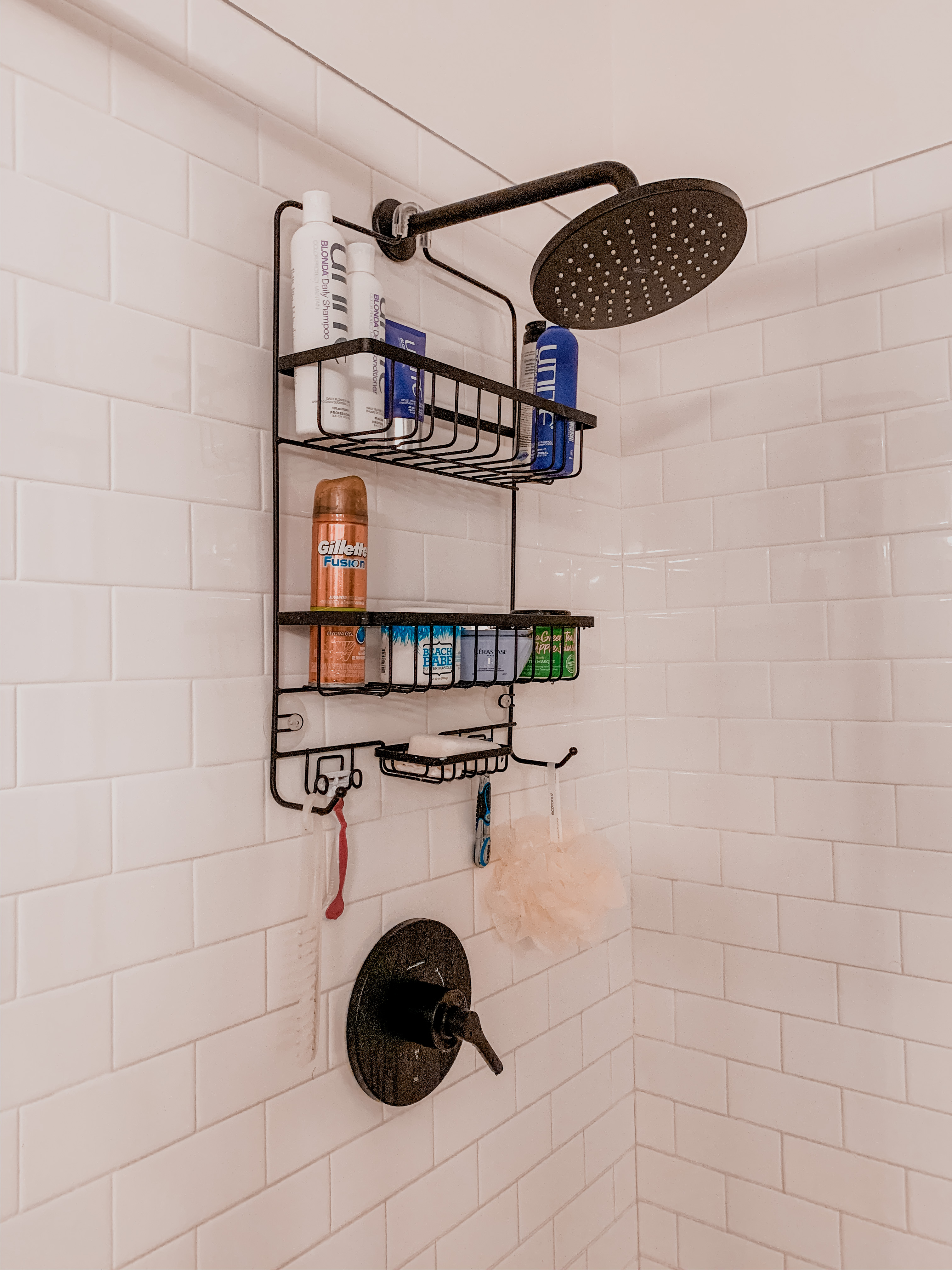 Master bathroom remodel by popular Nashville life and style blog: image of a remodeled bathroom with a Wayfair Matte Black Studio S Thermostatic Tub and Shower Faucet.